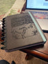 User generated photo of an InkWELL Press laser-etched leather cover