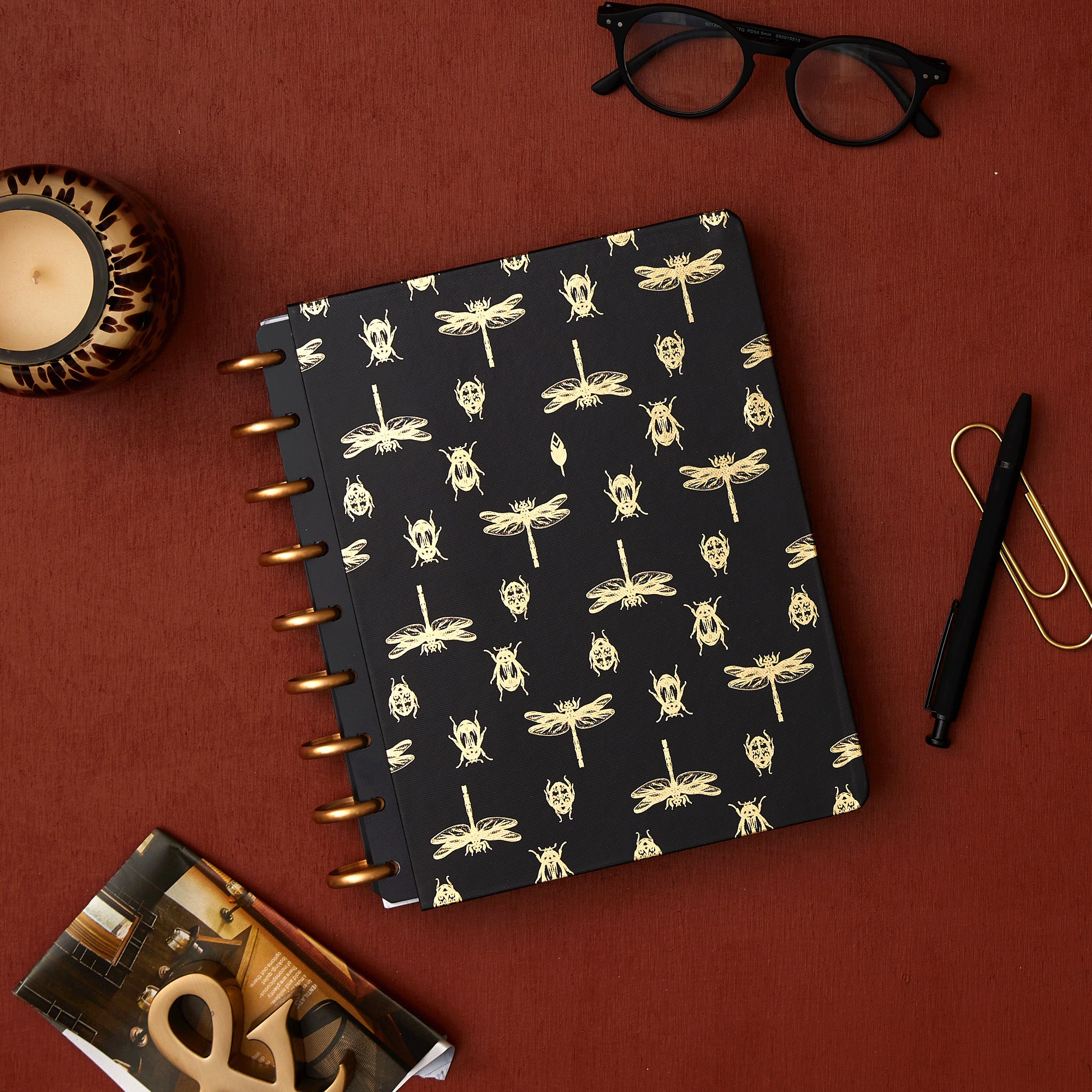 7x9 cover with gold foil beetles and fireflies on a black background.
