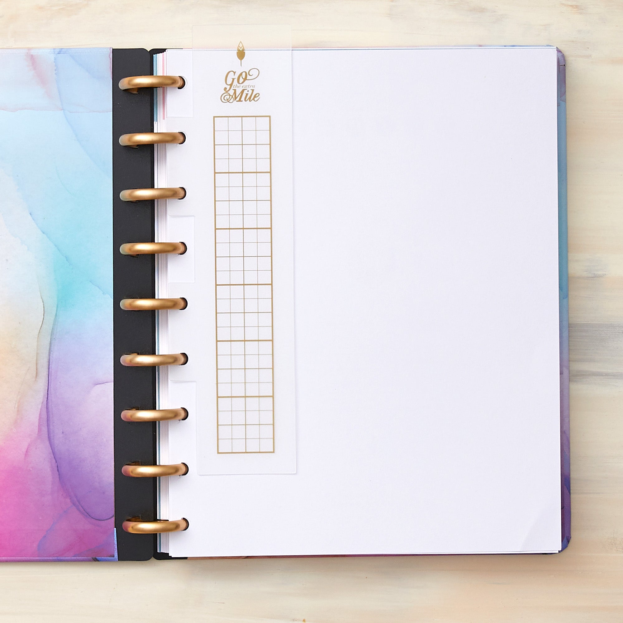 Flexible snap-on bookmark or page marker for your inkwell press planner with quote "Go The Extra Mile""