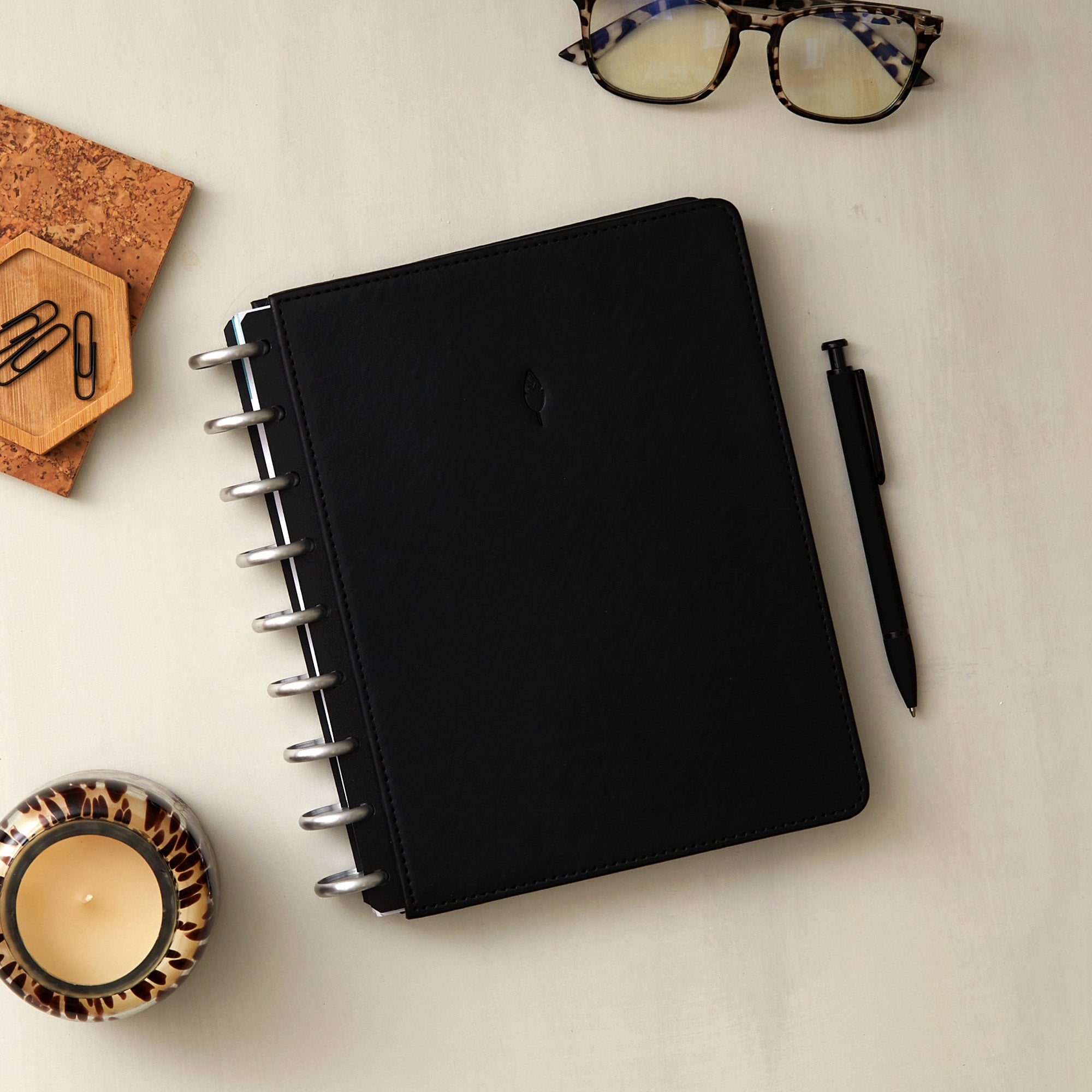 onyx black cover, silver discs, and lined notes plus insert for this bundle featuring lined writing space