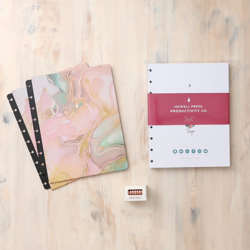 2024-2025 weekly monthly classic planner featuring horizontal planning layout, beautiful hard cover with marble design, and premium rose gold discs