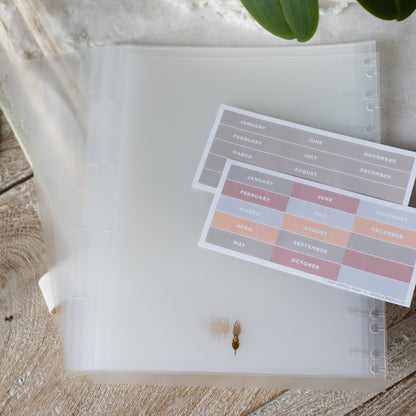poly tabs january to december in cream, grey, blue color pallete