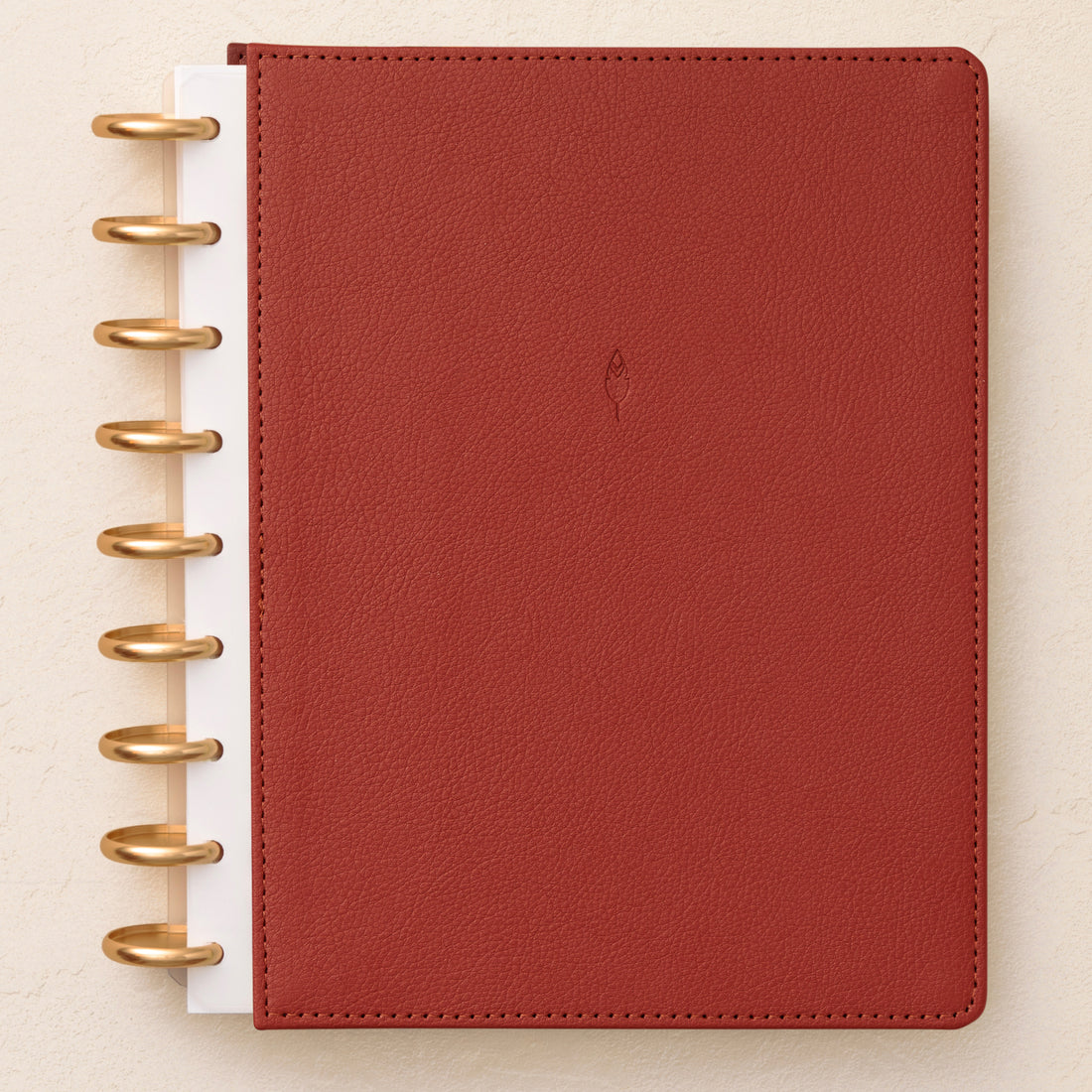 a rouge red burgandy faux leather front cover in 7x9 size with gold disc system