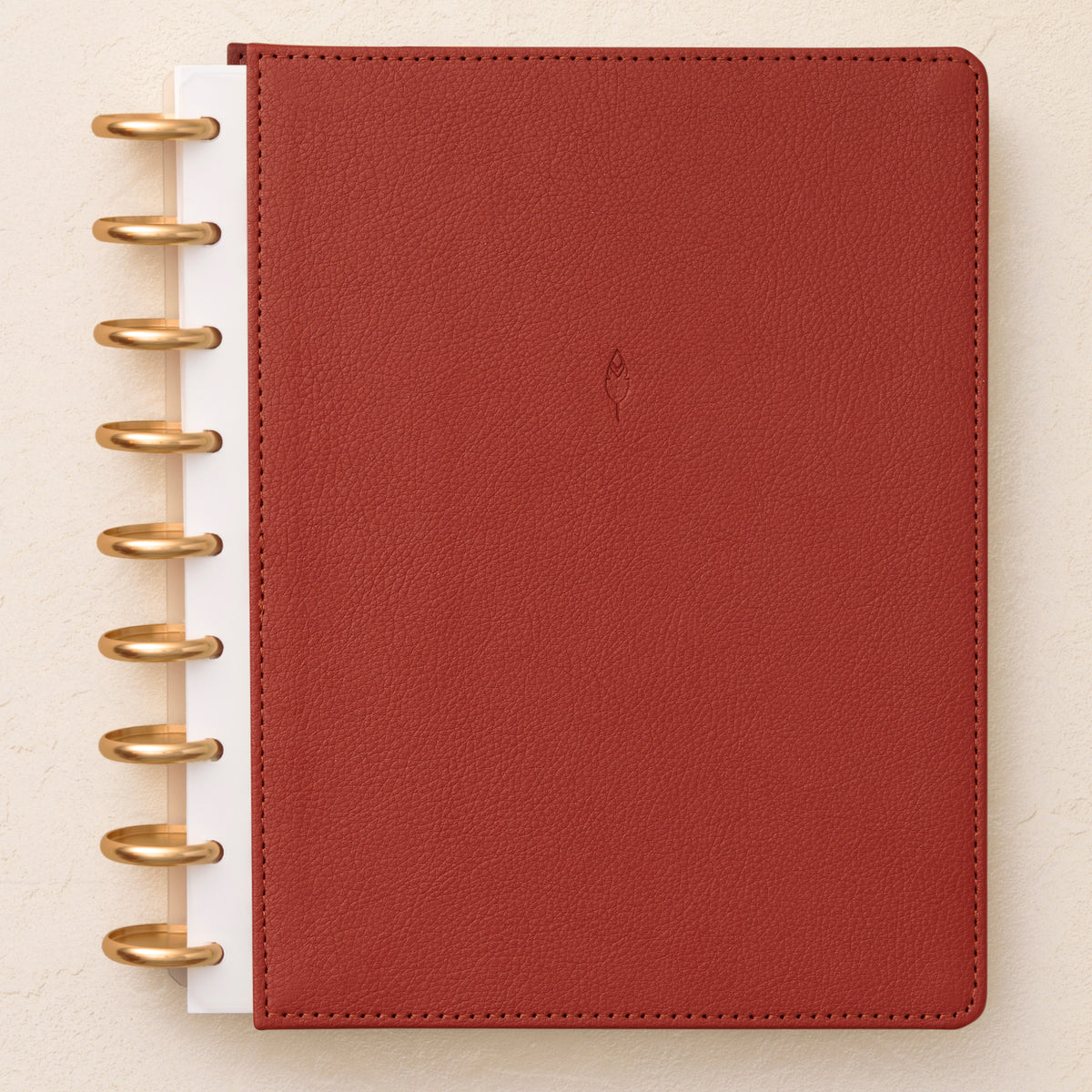 a rouge red burgandy faux leather front cover in 7x9 size with gold disc system
