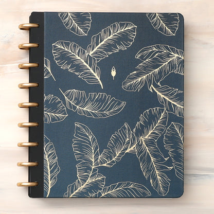 golden embossed quills on a dark blue/green back ground cover for this inkwell press planner