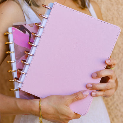 7x9 mochi pink faux leather vegan cover with rose gold discs, white-clear bindings.