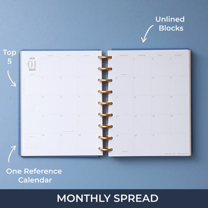 monthly spread january 2025 featuring a monthly spread with blank boxes for each day of the month. lined notes section