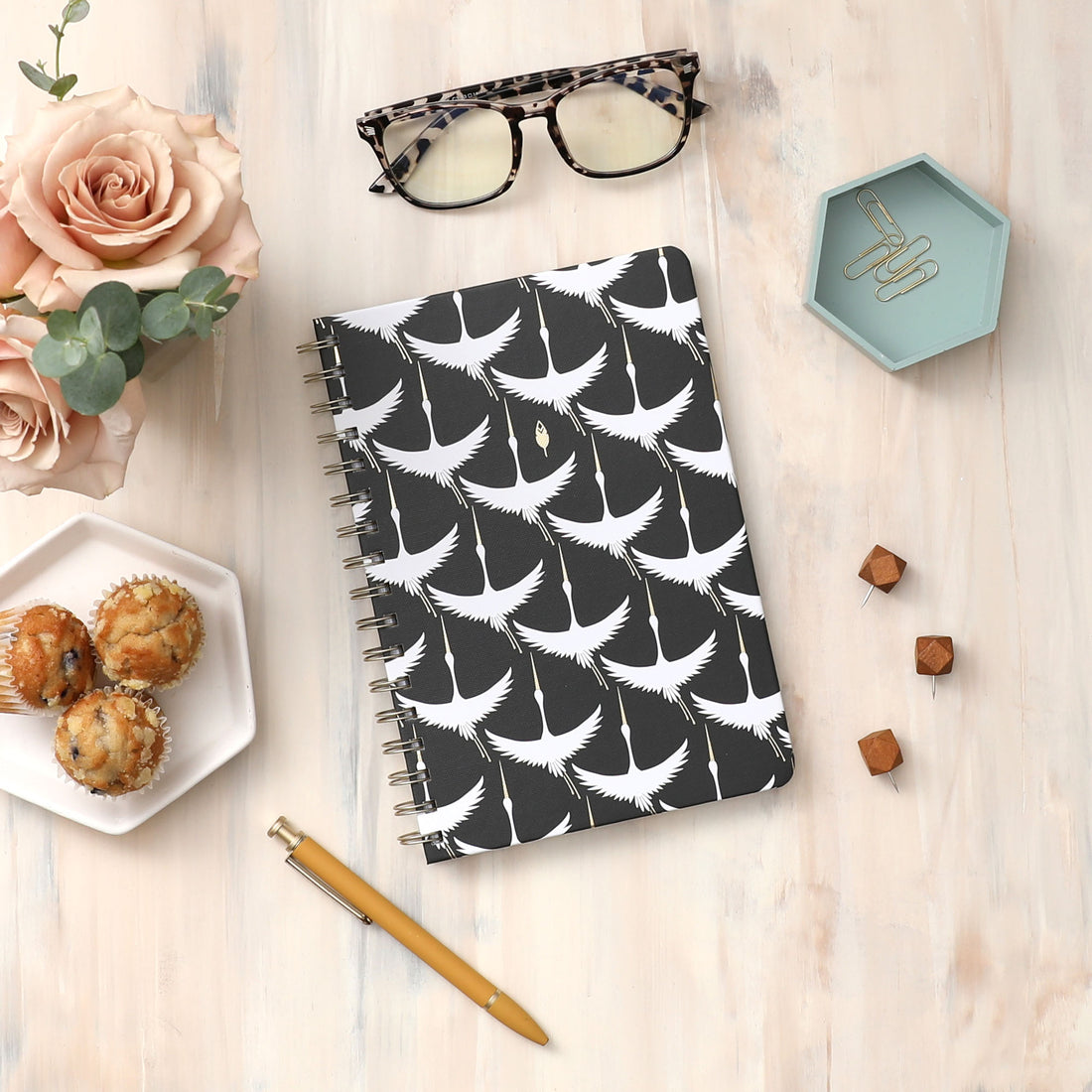 high quality lined and gridded notebook with gold twin wire o and front cover featuring flying swans