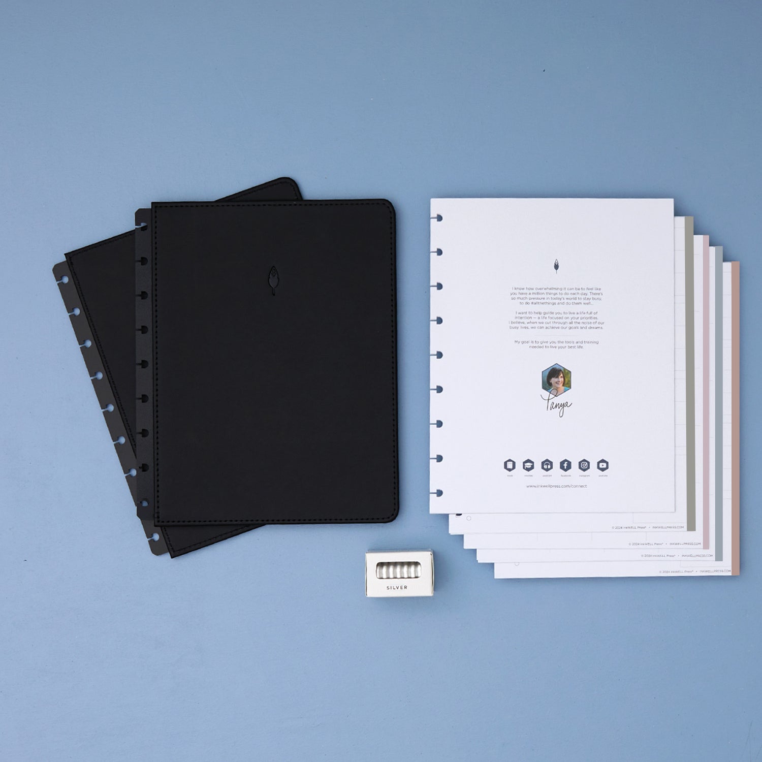 2026 planner in 7x9 size featuring black cover, silver discs, and flex horizontal planning weekly layout