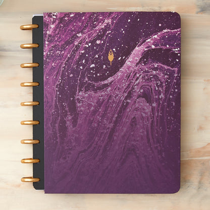 Amethyst Hard paper cover in 7x9 size featuring an elegant, geo wavy design in purple and gold discs.