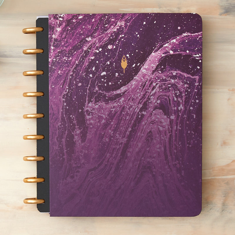Amethyst Hard paper cover in 7x9 size featuring an elegant, geo wavy design in purple and gold discs.