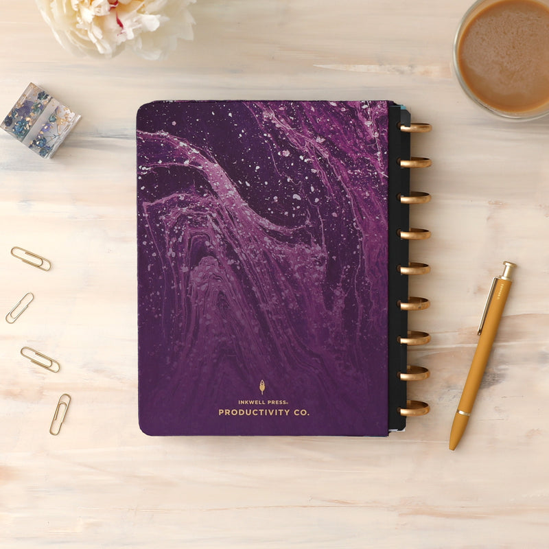 Amethyst Hard paper cover in 7x9 size featuring an elegant, geo wavy design in purple and gold discs.