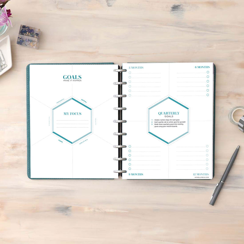 the undated daily planner features a goals section with all your focus' and quarterly goals to enhance your planning and organization to achieve your goals.