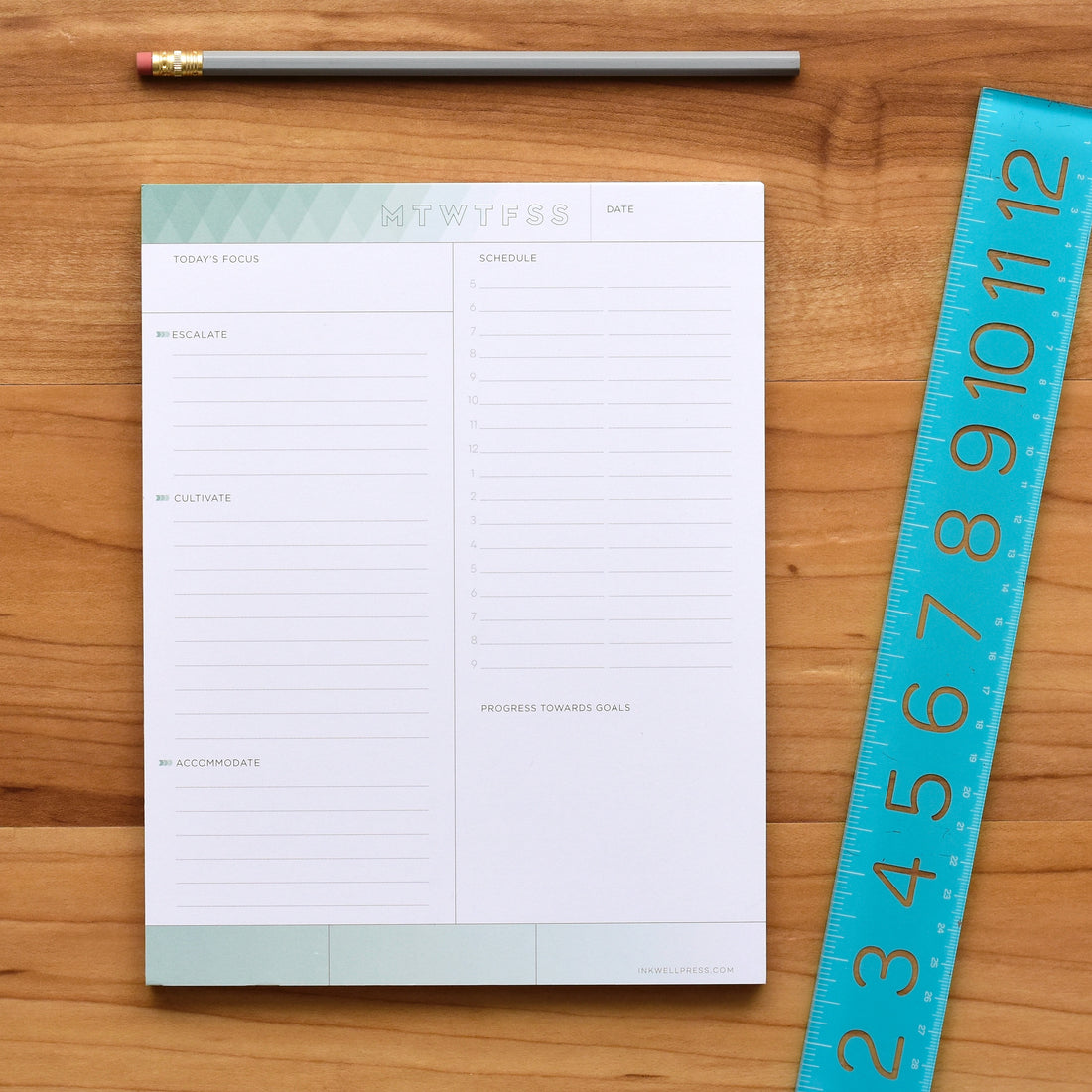 inkWELL Press Daily Focus Notepad showing Colorful Daily Schedule and Accomplishments
